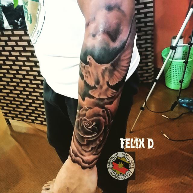 Man Left Sleeve Dove And Rose Tattoo