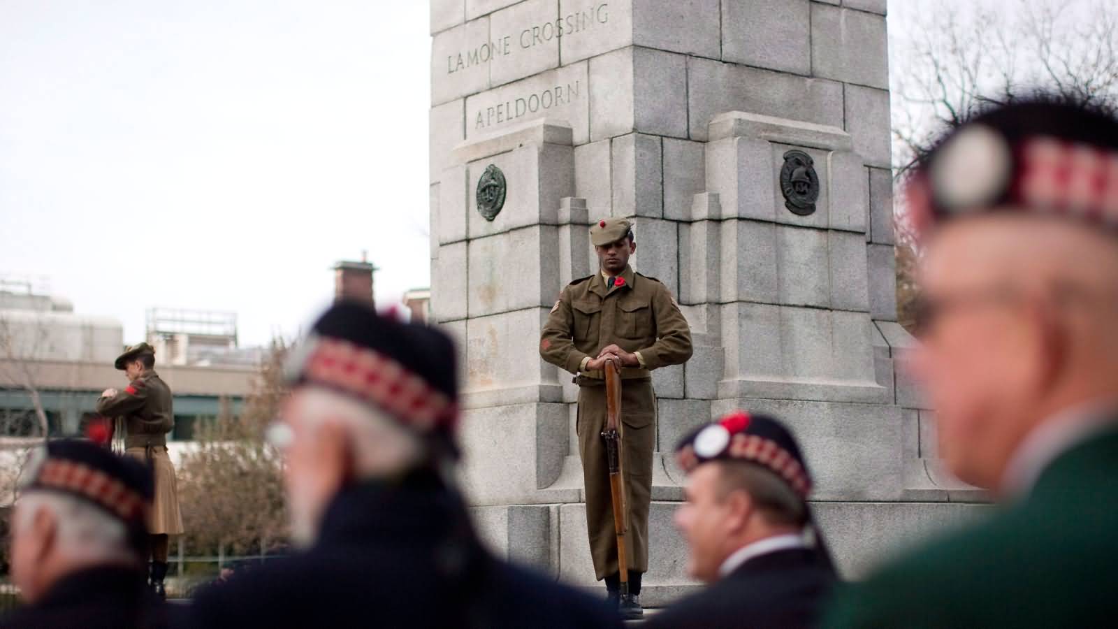 Members Of The Armed Forces Form Part Of An Honour Guard At The Monument During Remembrance Day Ceremony