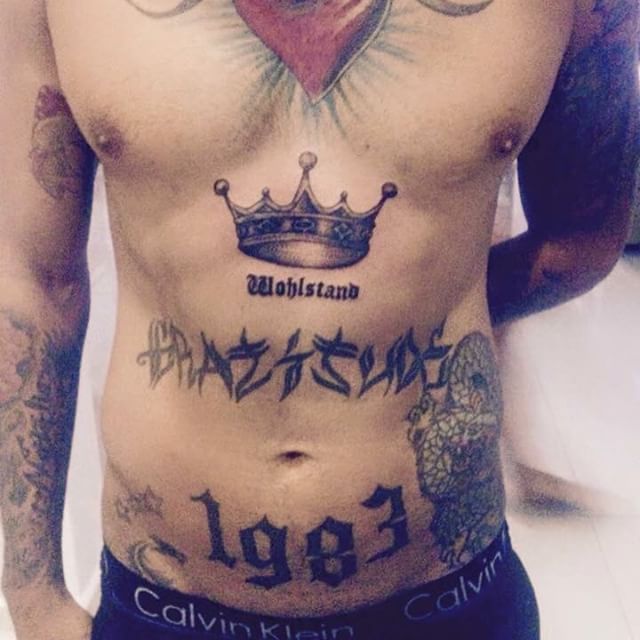 Memorial Year And Crown Tattoo On Chest
