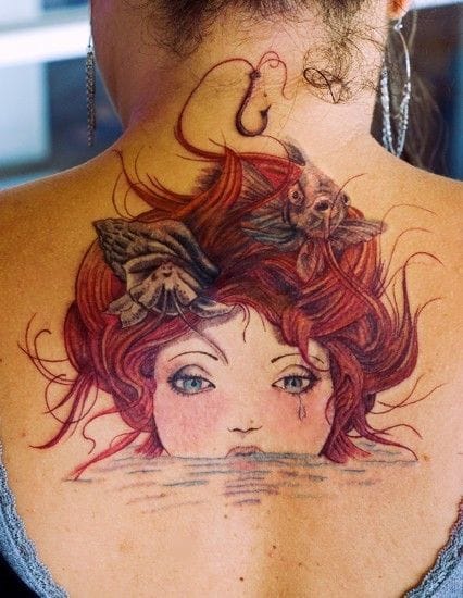 Mermaid Head In Water Tattoo On Upper Back