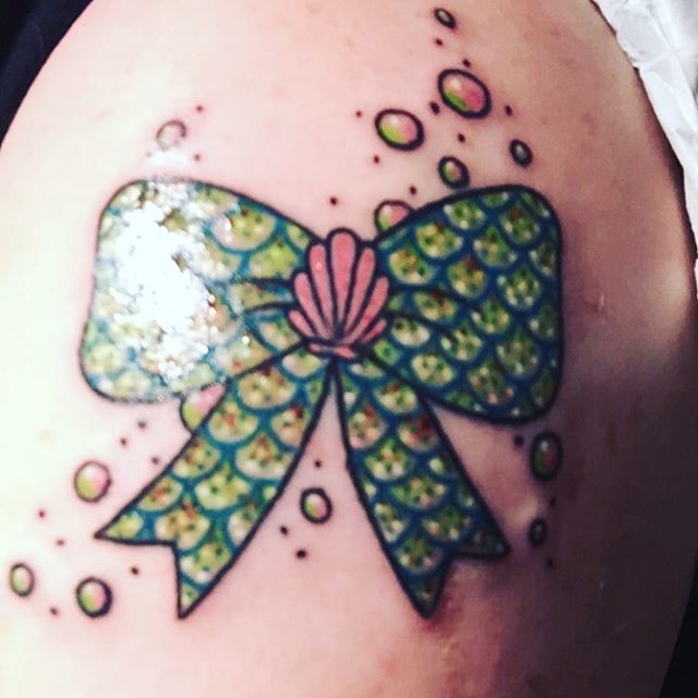 Mermaid Scale Bow Tattoo On Shoulder