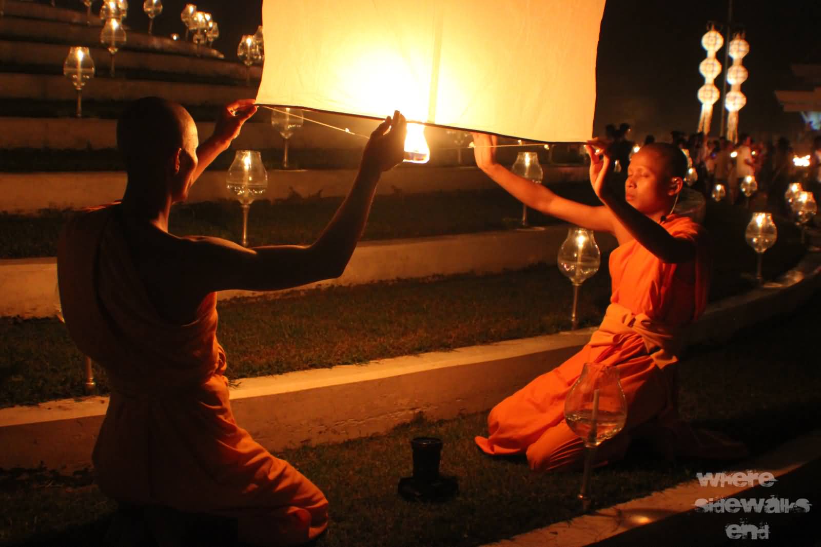 Monks Releasing Lantern During Yi Peng Festival