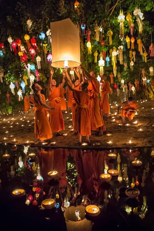 Monks Releasing Paper Lantern On Yi Peng Festival