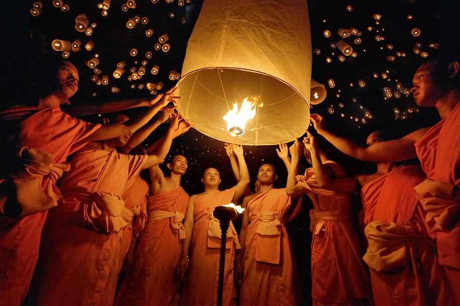 Monks With Paper Lanterns For Yi Peng Festival