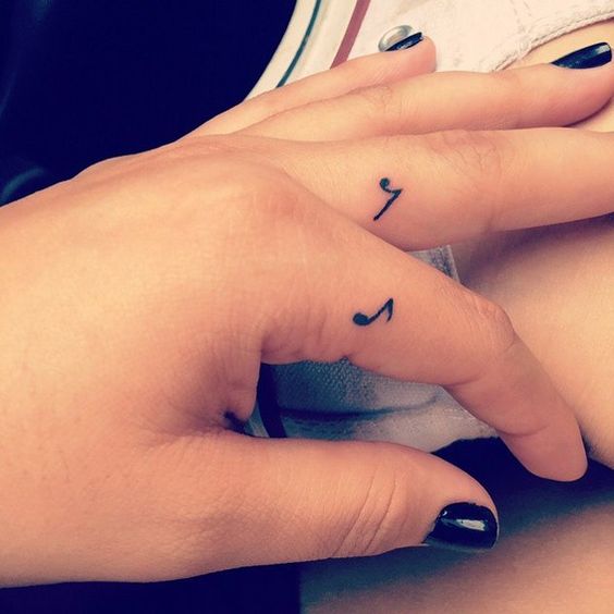 Music Notes Tattoos On Girl Side Finger