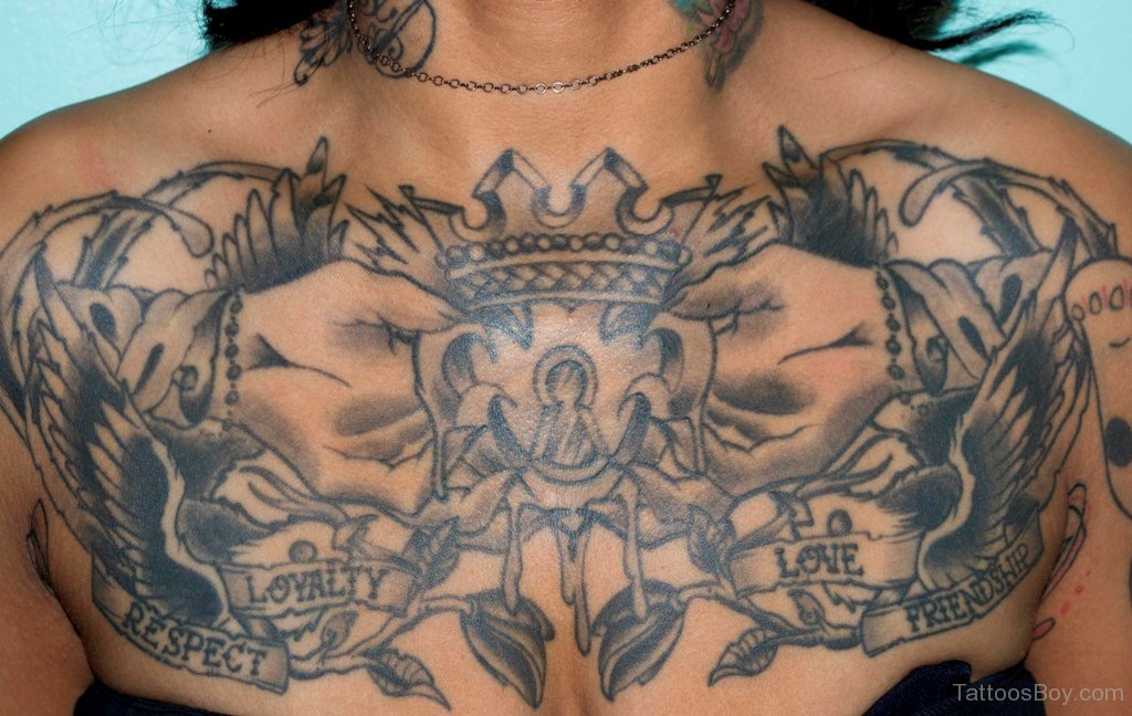 Nice Black And Grey Crown In Hands Tattoo On Chest