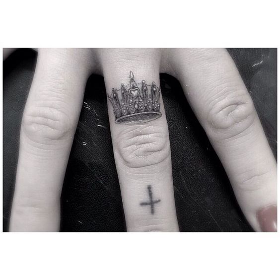 Nice Cross And Crown Tattoo On Finger