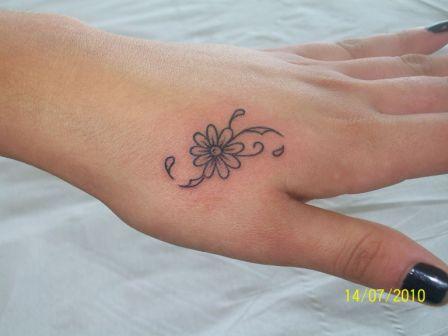 Nice Daisy Flower Tattoo On Left Hand