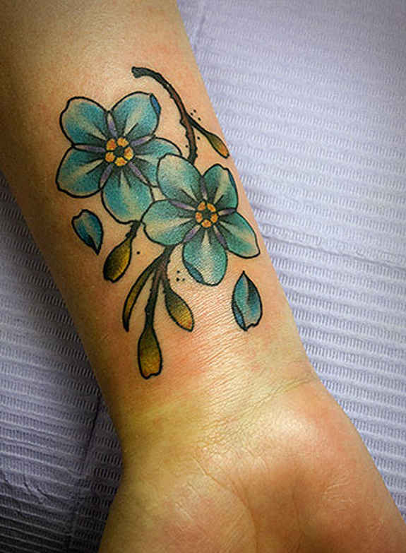 Nice Flowers Tattoos On Right Wrist