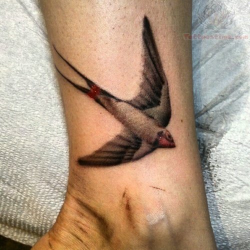 Nice Flying Bird Ankle Tattoo