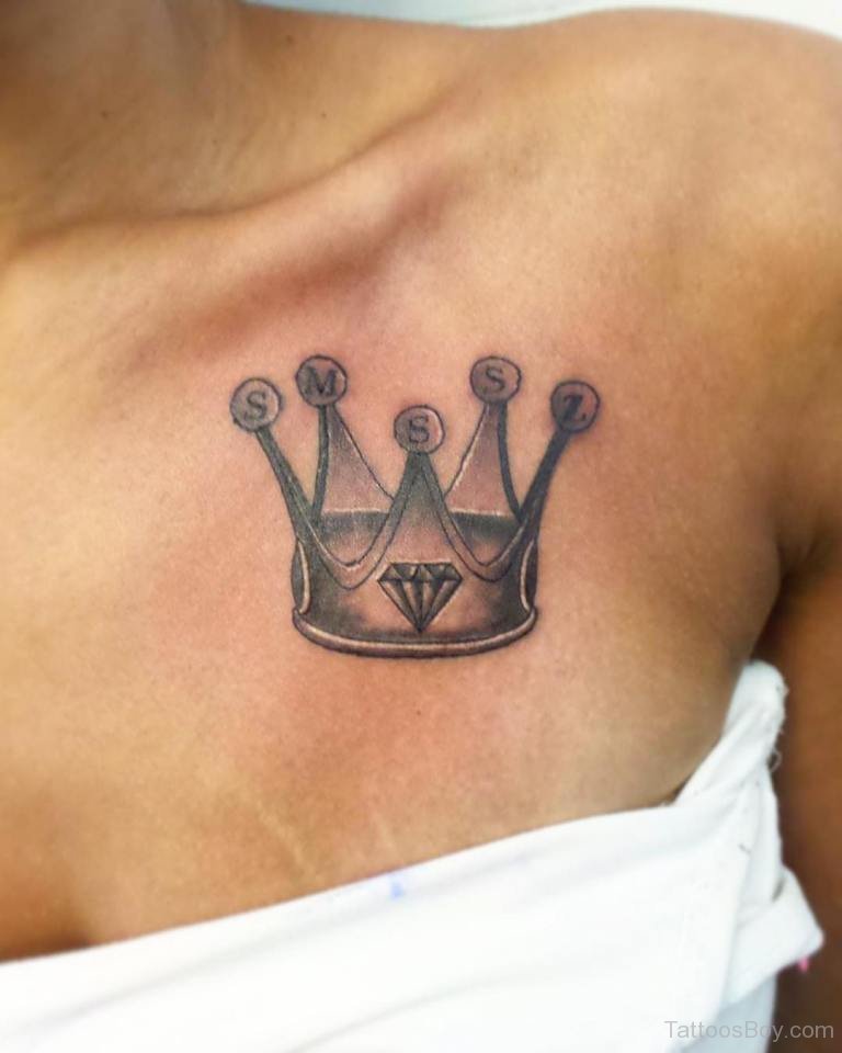 Nice Grey Crown Tattoo On Front Shoulder