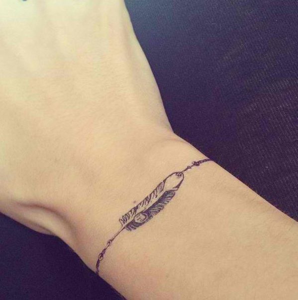 Nice Grey Ink Feather Wrist Bracelet Tattoo