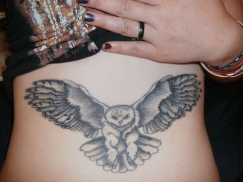 Nice Grey Ink Flying Owl Tattoo
