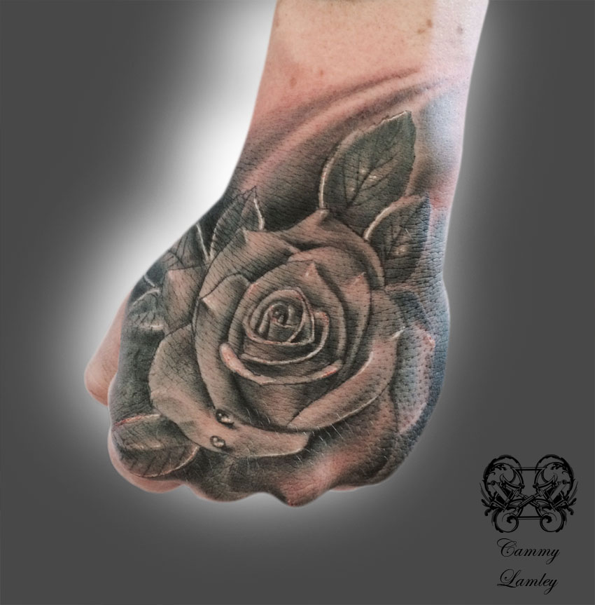 Nice Grey Rose Tattoo On Girl Left Hand