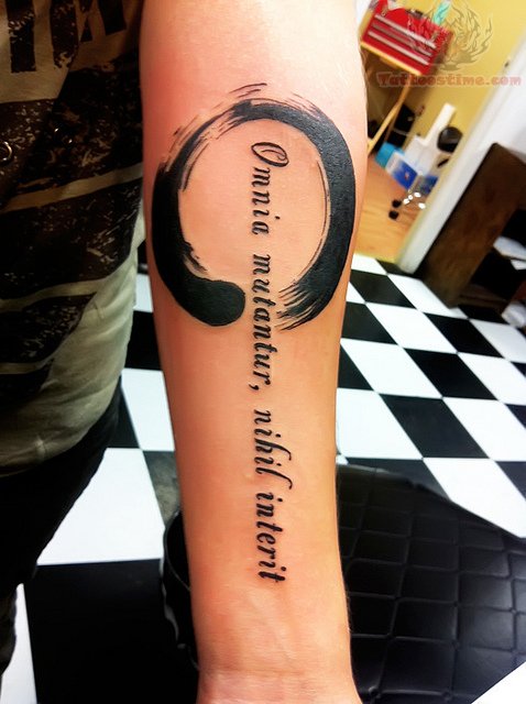 Omnia Mutantur, Nihil Interit - Black Zen Circle Tattoo On Left Forearm