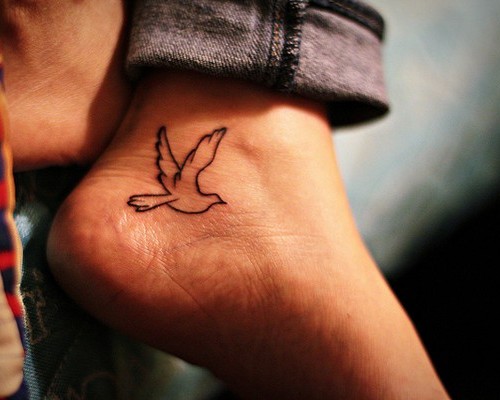 Outline Flying Bird Tattoo On Ankle