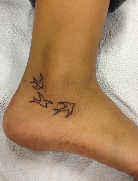 Outline Flying Birds Tattoo On Ankle