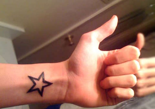Outline Star Tattoo On Left Wrist For Men