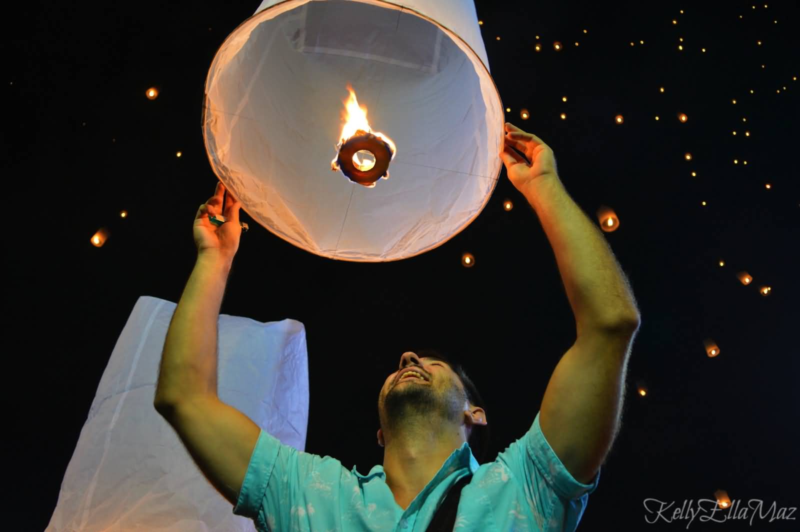 Paul Releasing A Floating Lantern During Yi Peng Lantern Festival Celebration