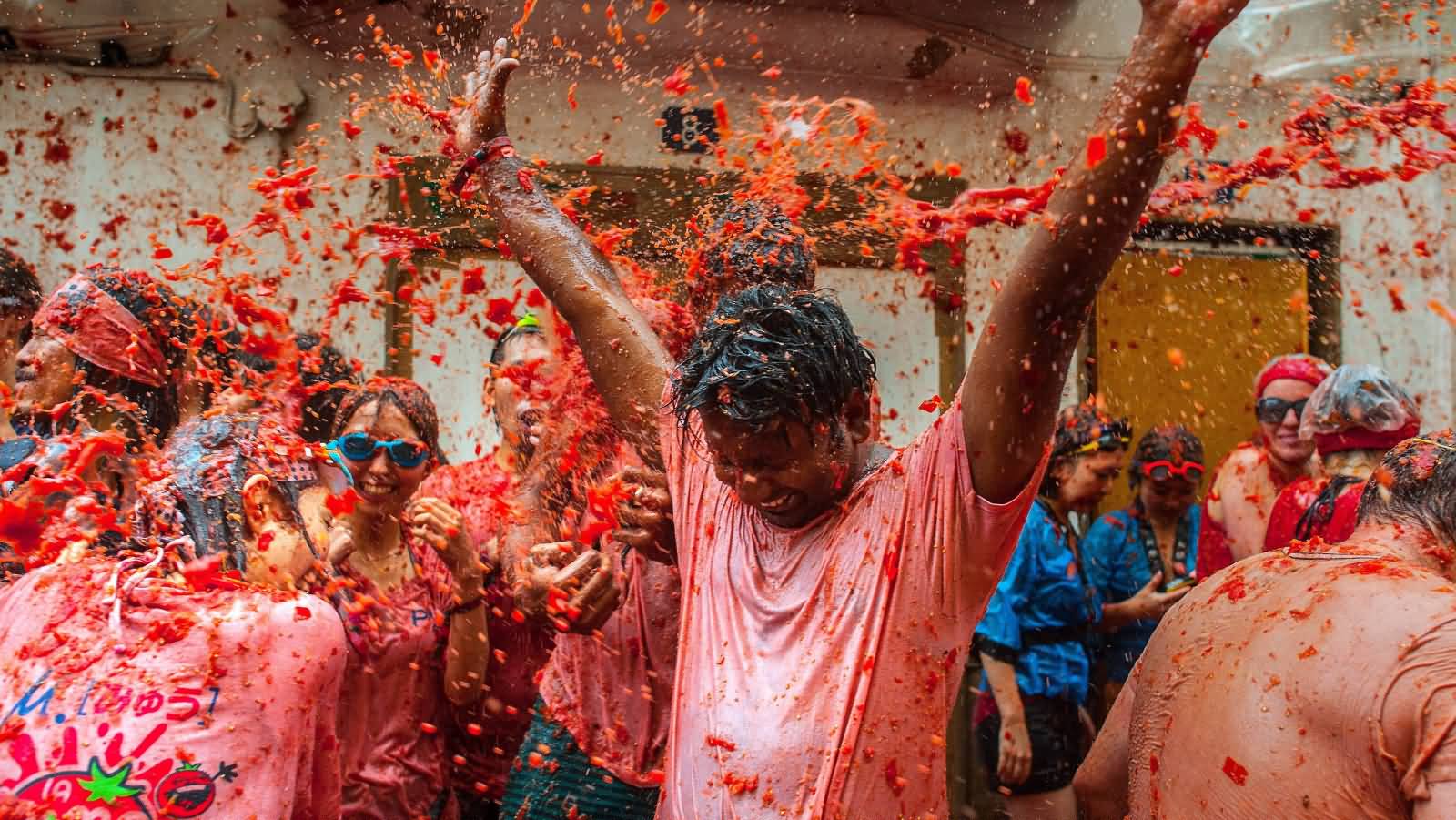 People Celebrating La Tomatina Festival
