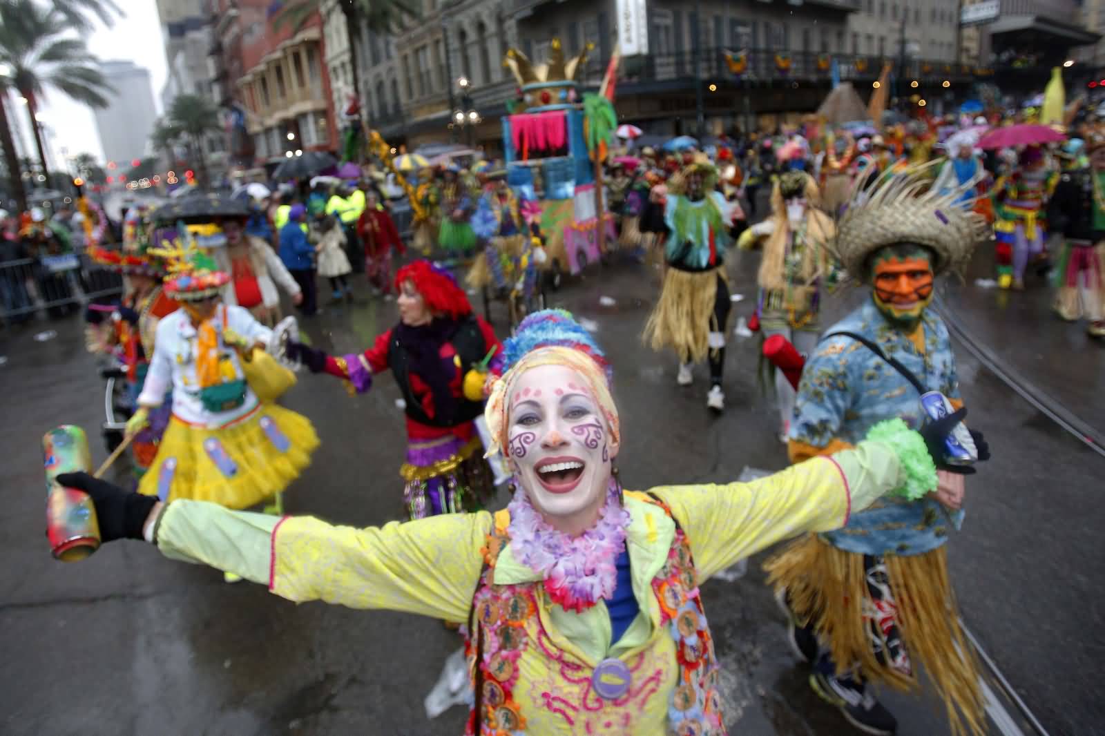 People Of New Orleans Wearing Costumes And Masks During Mardi Gras Parade