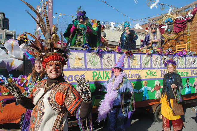 People Taking Part In Mardi Gras Parade