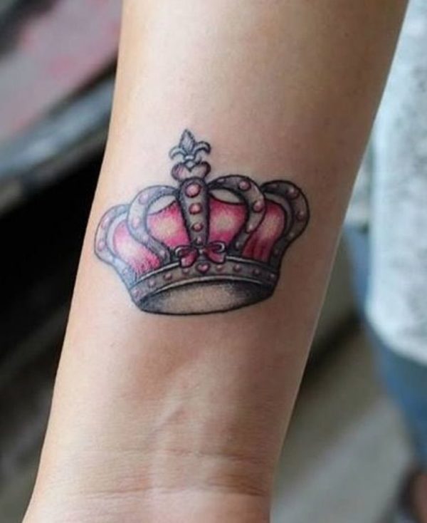 Pink crown Tattoo On Girl Right Wrist
