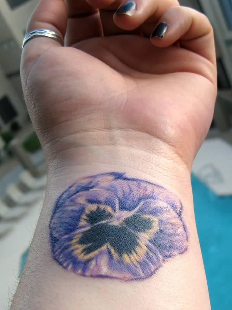 Purple Flower Tattoo On Girl Left Wrist