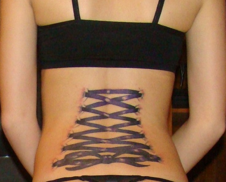 Purple Ribbon Corset Tattoo On Girl Lower Back