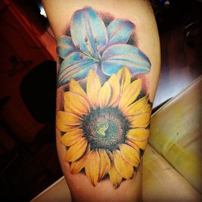 Realistic Lily Flower And Sunflower Tattoo