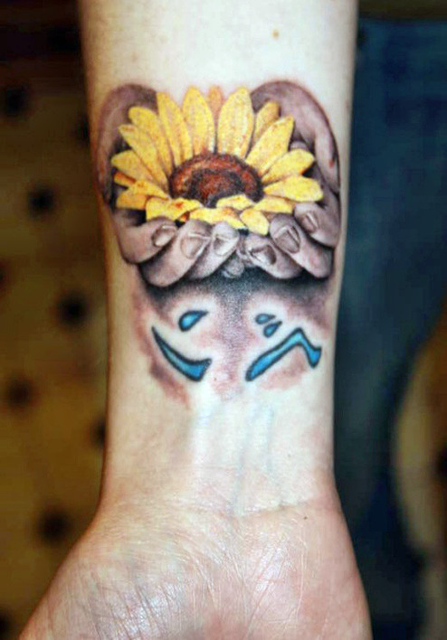 Realistic Sunflower In Hands Tattoo On Forearm