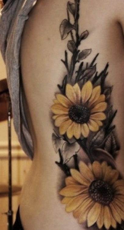 Realistic Sunflower Tattoo On Girl Side Rib