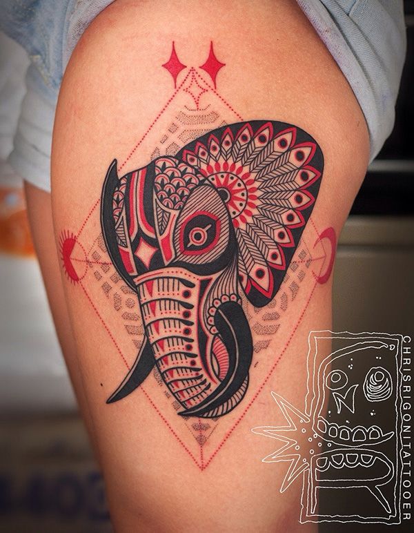 Red And Black Traditional Elephant Head Tattoo On Girl Left Thigh