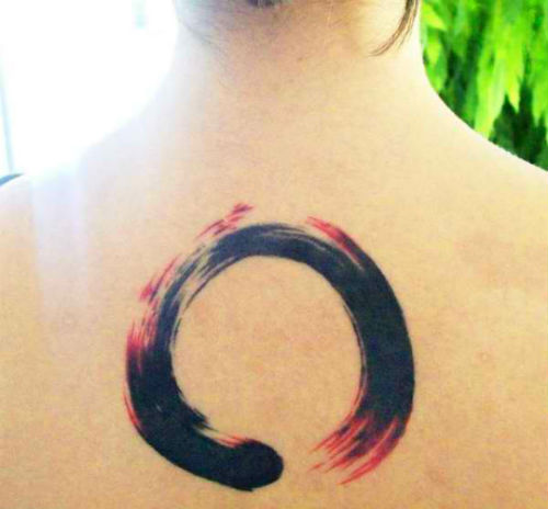 Red And Black Zen Buddhiam Circle Tattoo On Upper Back