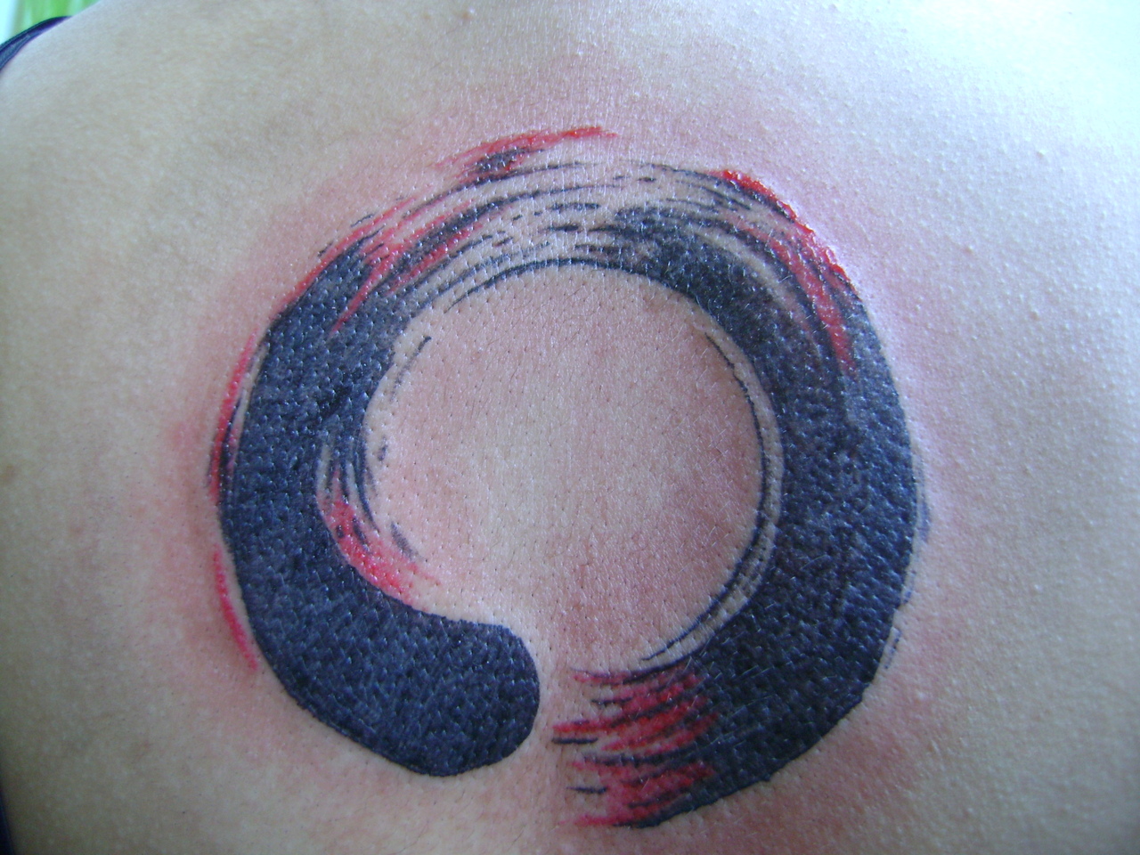 Red And Black Zen Enso Circle Tattoo Design