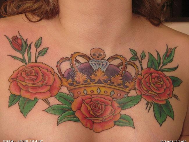 Red Rose Flowers And Crown Tattoo On Man Chest