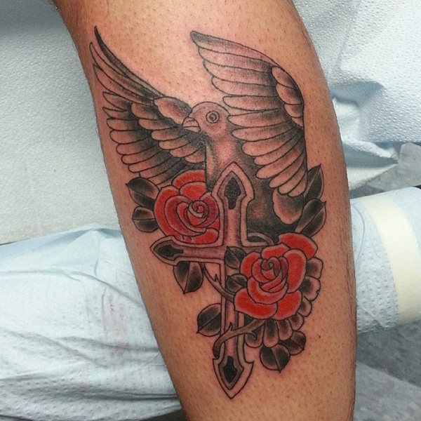 Red Roses With Cross And Flying Dove Tattoo On Leg