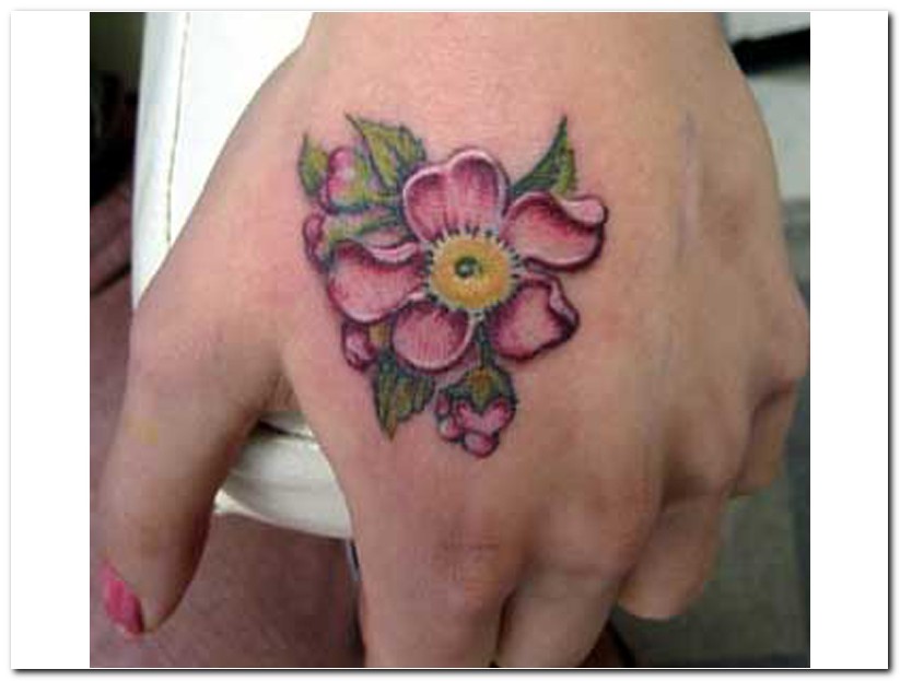 Rhododendron Flower Tattoo On Girl Left Hand