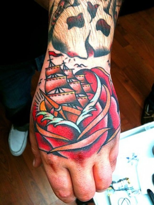 Ship In Rose Tattoo On Left Hand