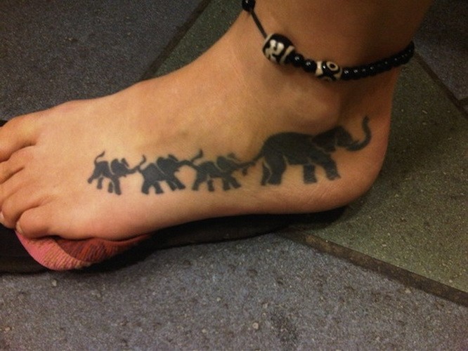 Silhouette Elephant Family Tattoo On Left Foot
