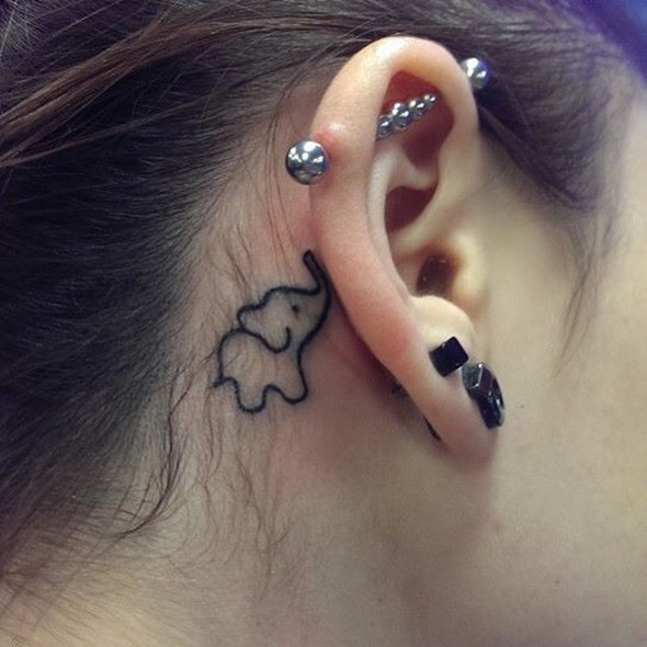 Simple Black Outline Elephant Tattoo On Girl Right Behind The Ear
