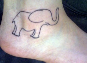 Simple Black Outline Elephant Tattoo On Right Ankle
