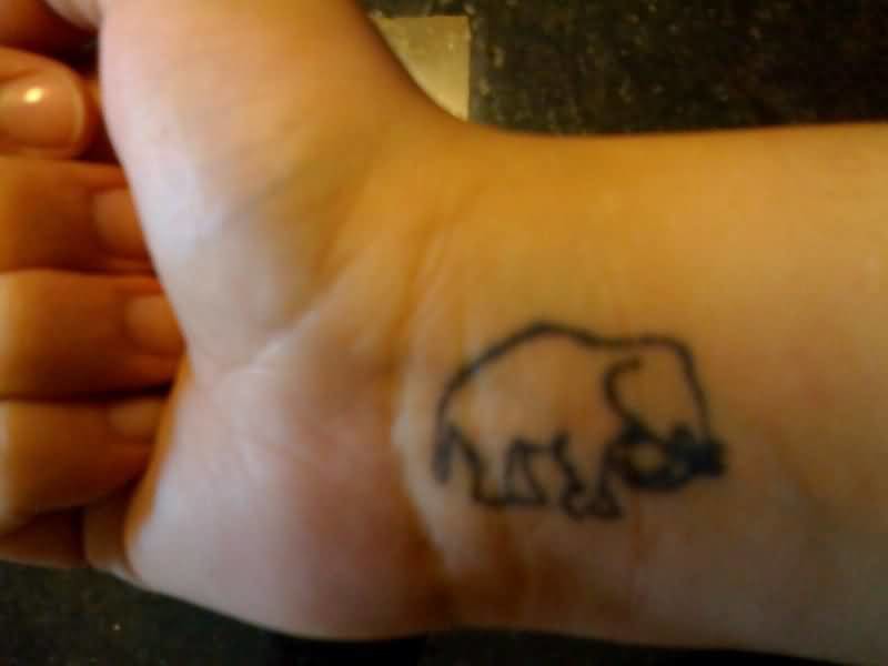 Simple Black Outline Elephant Tattoo On Wrist