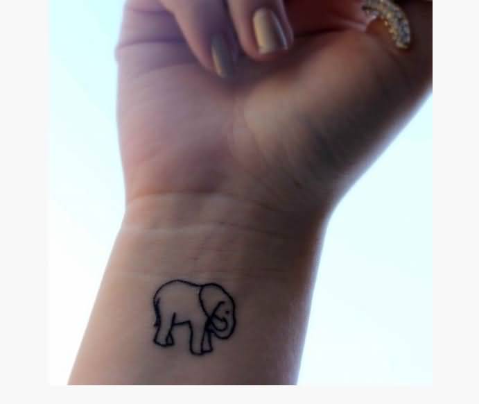 Simple Black Outline Small Baby Elephant Tattoo On Girl Right Wrist