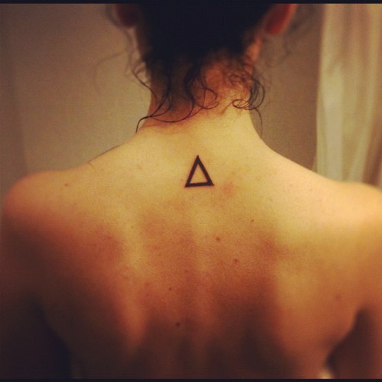 Simple Black Outline Triangle Tattoo On Girl Upper Back