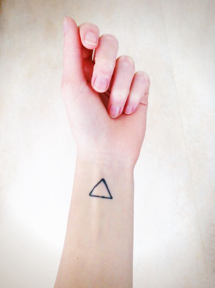 Simple Black Outline Triangle Tattoo On Left Wrist