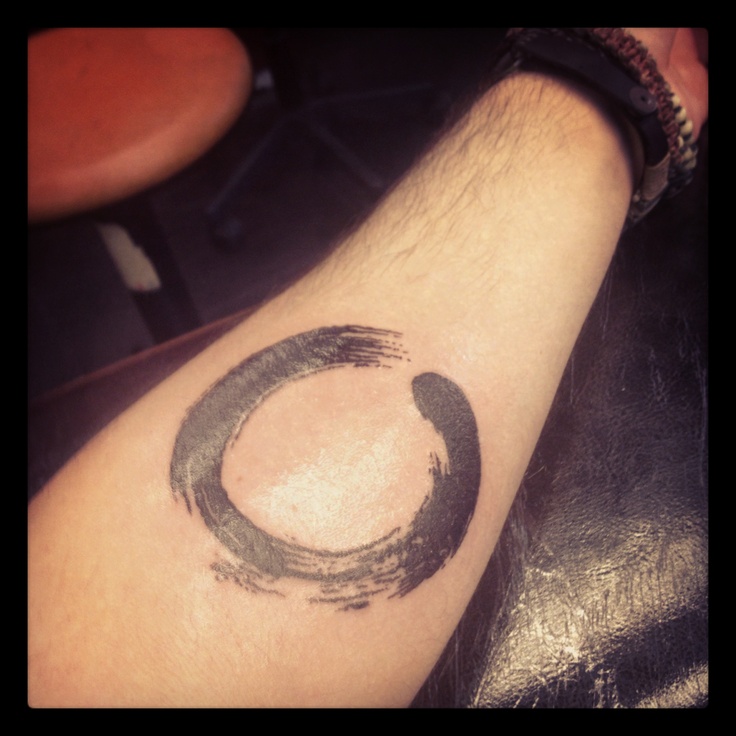 Simple Black Zen Circle Tattoo On Forearm