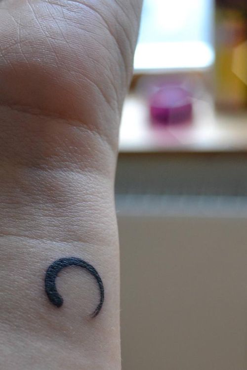 Simple Black Zen Circle Tattoo On Wrist