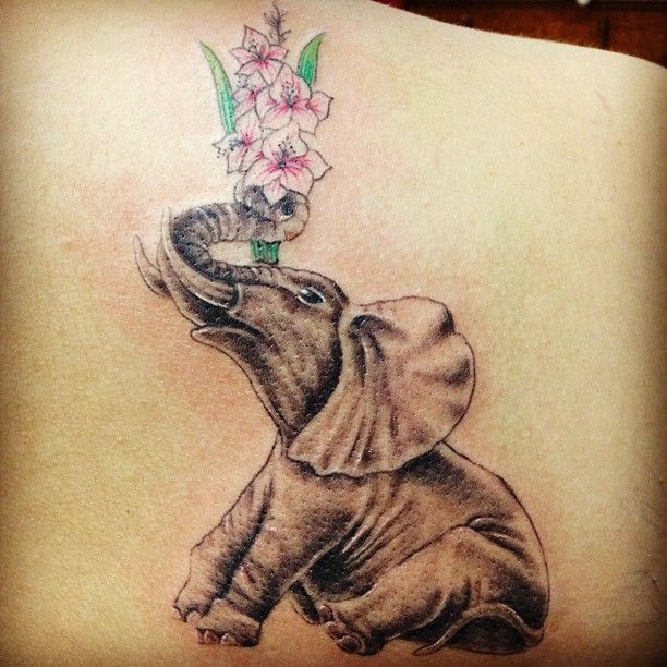 Simple Elephant With Flowers Tattoo Design For Back Shoulder