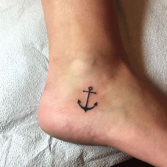 Small Black Anchor Tattoo On Girl Ankle